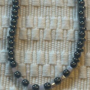 Hematite and faceted light pink crystal centered necklace.